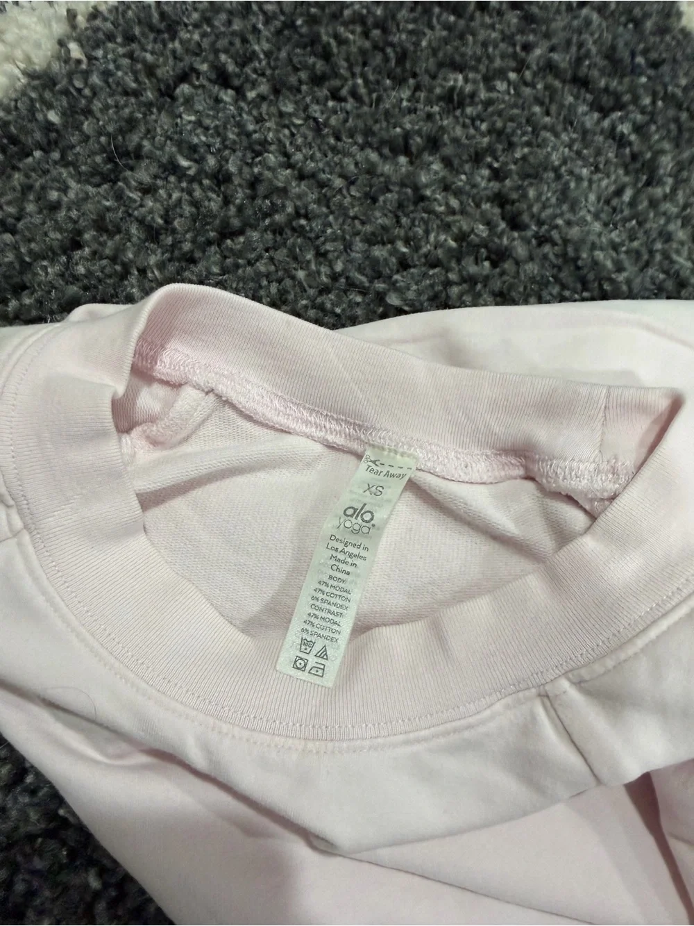 ALO Yoga Light Pink Cropped Long Sleeve Top